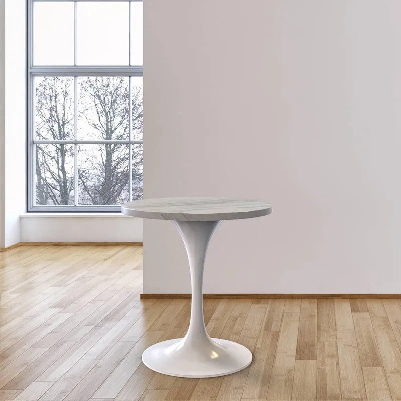 Table à manger ronde avec plateau en résine et piètement colonne en acier blanc