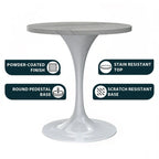Table à manger ronde avec plateau en résine et piètement colonne en acier blanc