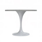 Table à manger ronde avec plateau en résine et piètement colonne en acier blanc